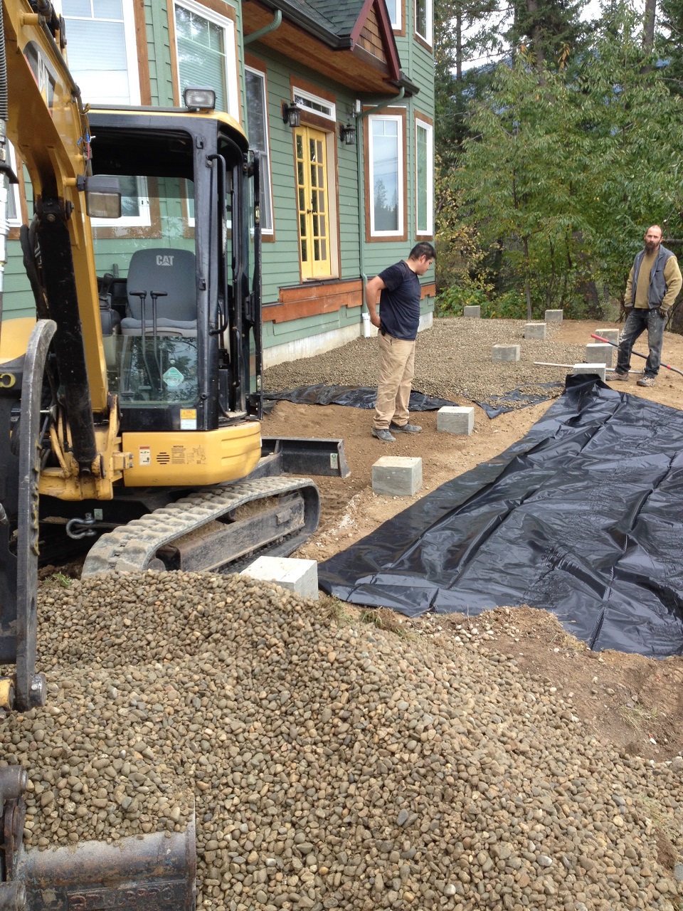 deck weed suppression barrier and rock